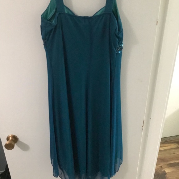 Petite size 12 but will fit a buster individual don’t worry. - Picture 2 of 2